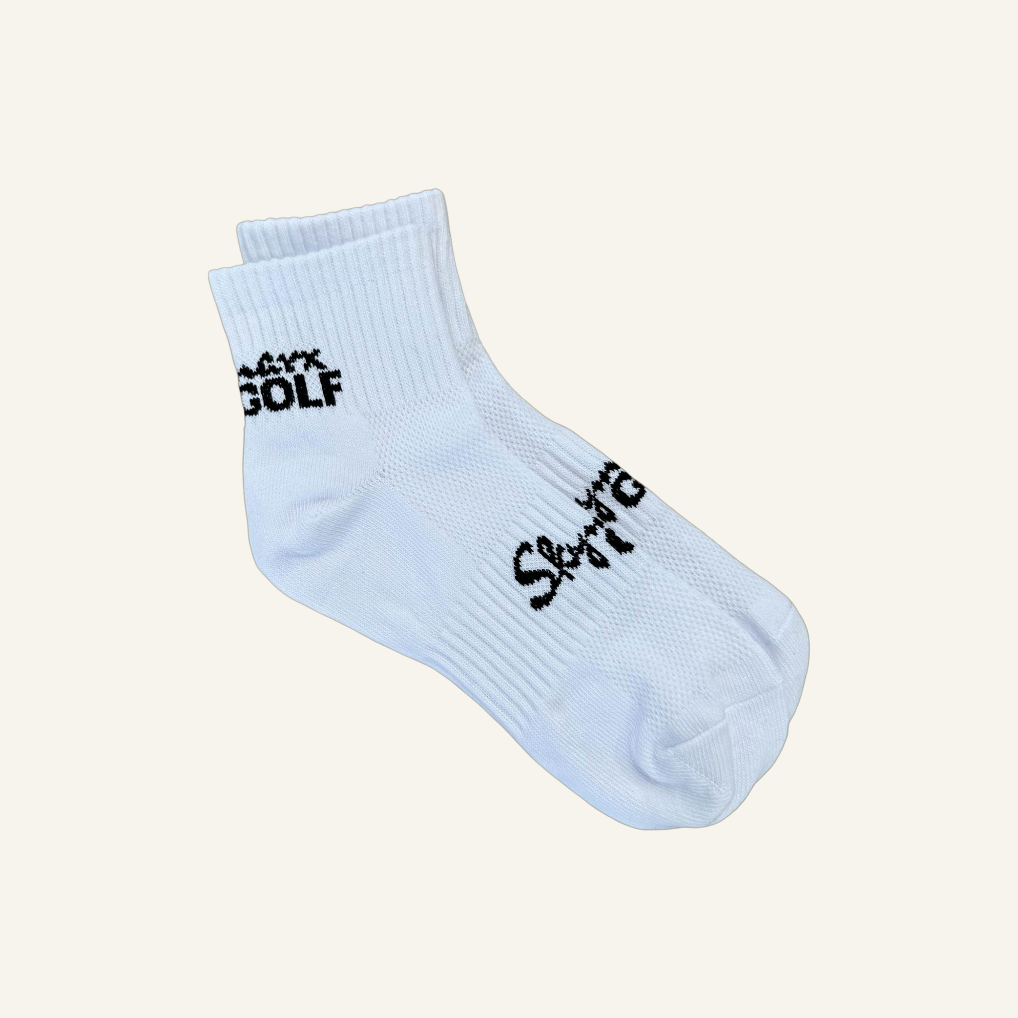 valkoiset golfsukat logolla