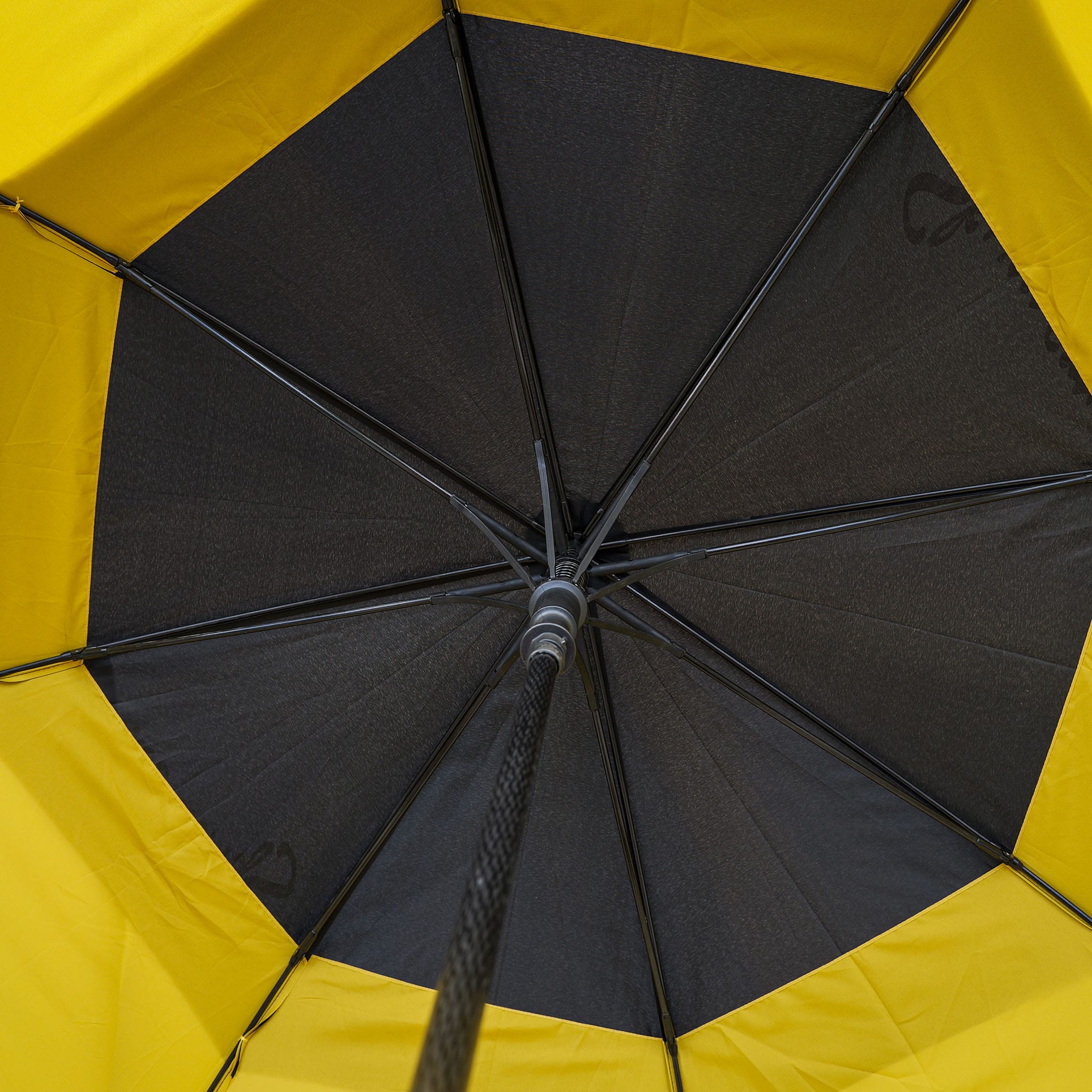 yellow black golf umbrella